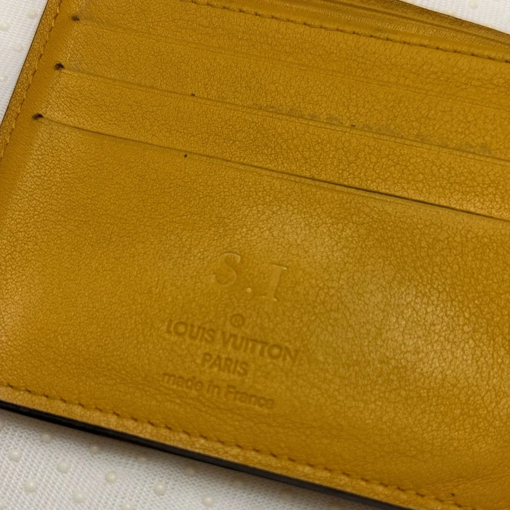 LOUIS VUITTON - MUSTARD YELLOW TAURILLON LEATHER BIFOLD WALLET